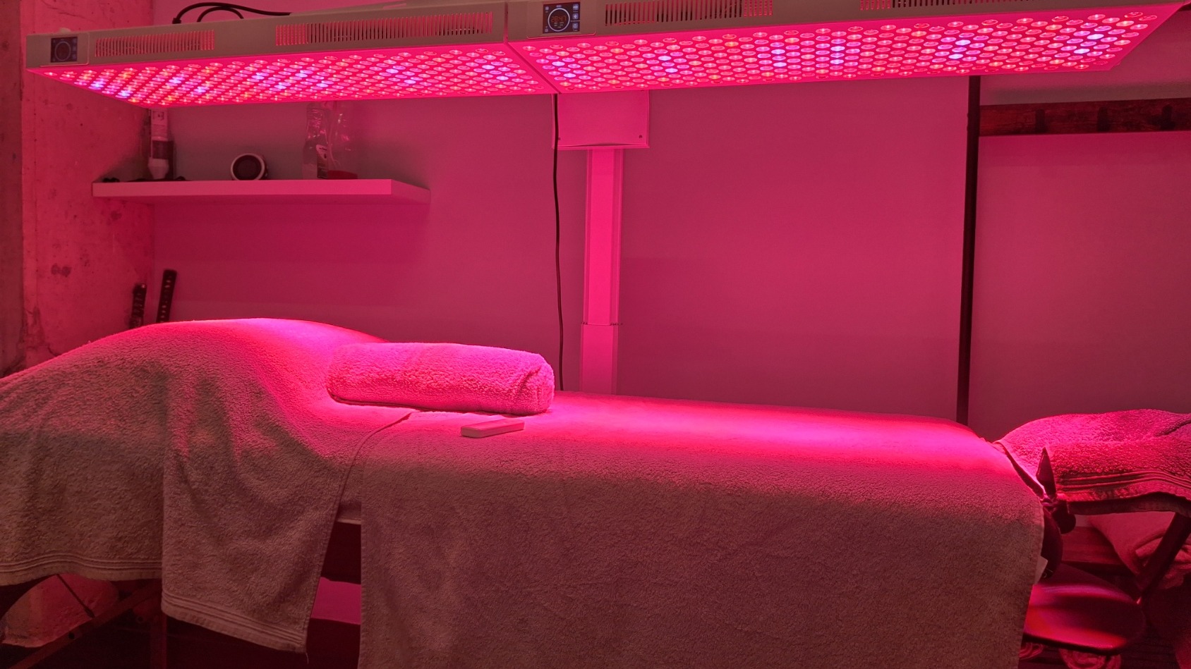 Full-body red light therapy LED panels in clinical treatment room